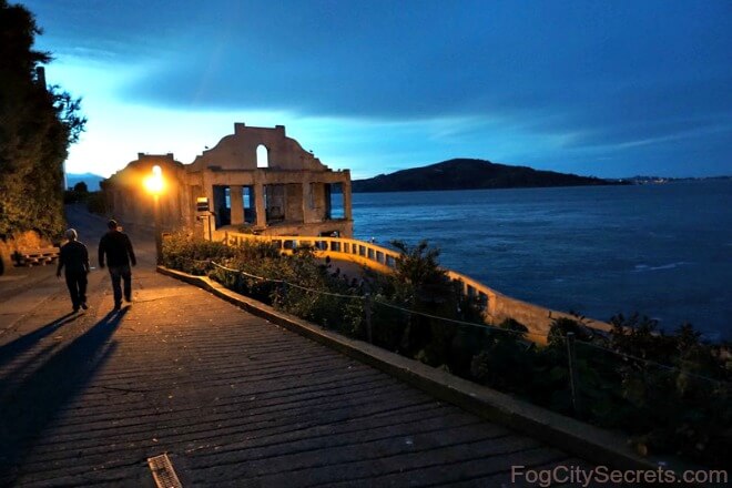 Alcatraz after dark, couple on walkway