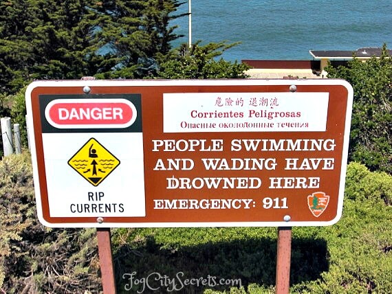 Warning sign for rip currents, China Beach, San Francisco